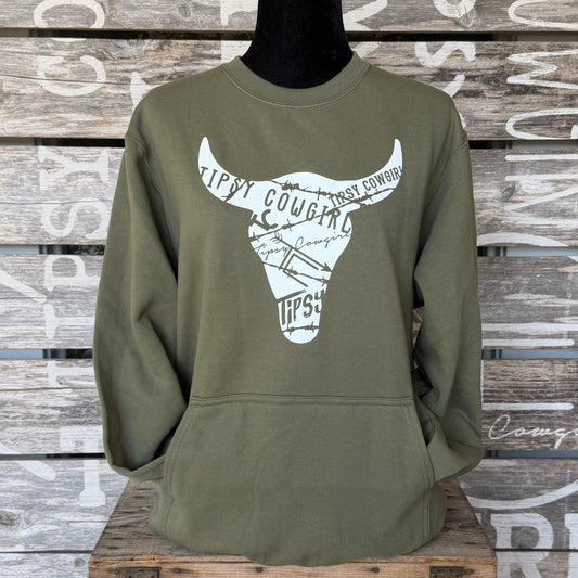 Tipsy Cowgirl Heritage Skull pocket crewneck in Olive Drab Green featuring a white western skull graphic made from signature brand artwork